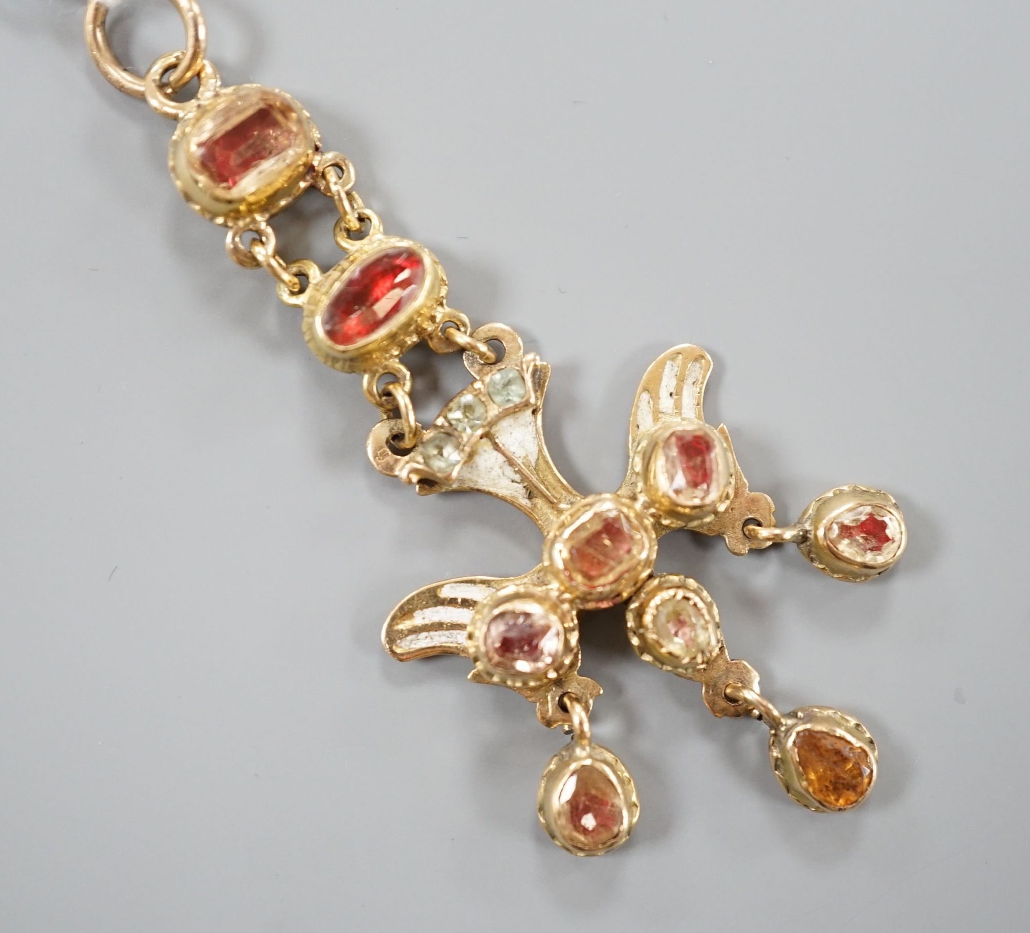 A 19th century yellow metal, foil backed gem and enamel set drop pendant, 69mm, gross weight 10.5 grams (a.f.).